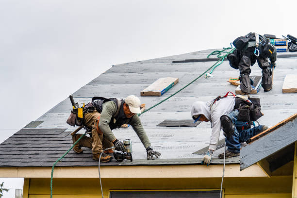 Professional Roofing technician working in Pownal, VT